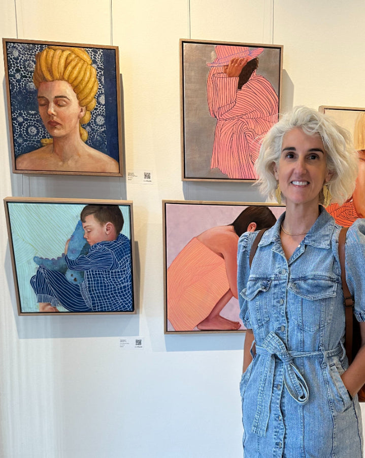 Artist Leah mariani with Golden Crown painting