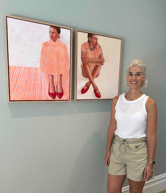 Artist with Replay painting in home