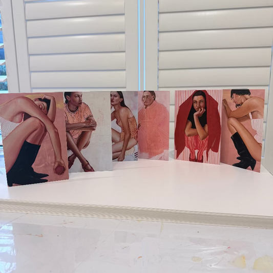 Individual contained blank gift cards in warm, pink, peach, and red tones