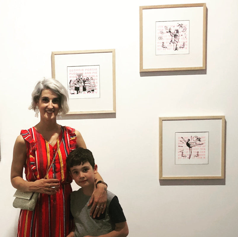 Sreenprints framed with artist