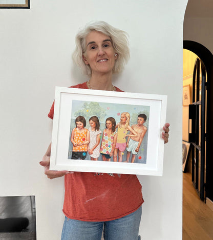 Artist holding Waiting A3 print framed