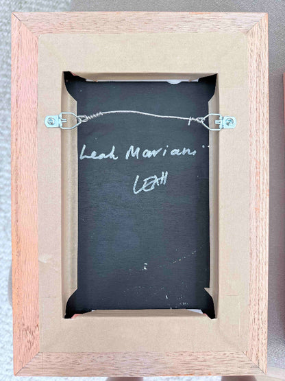 Framed-mini-painting-pink-frame--back-with-signature